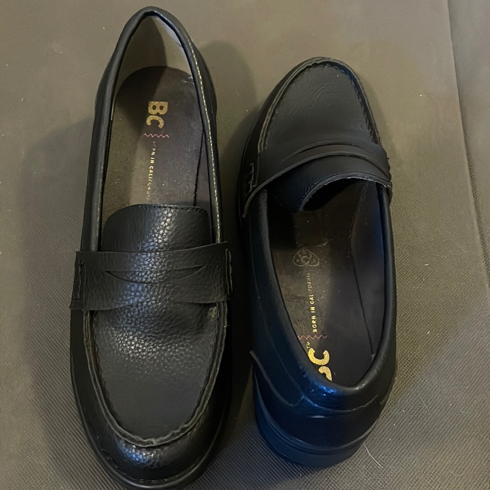 Black low platform loafers